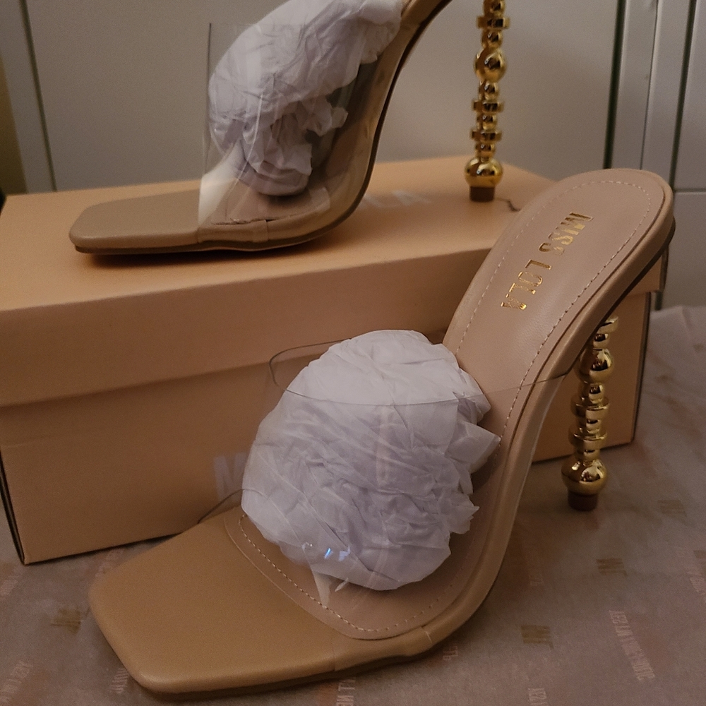 NIB. Clear/Nude mules/slides.